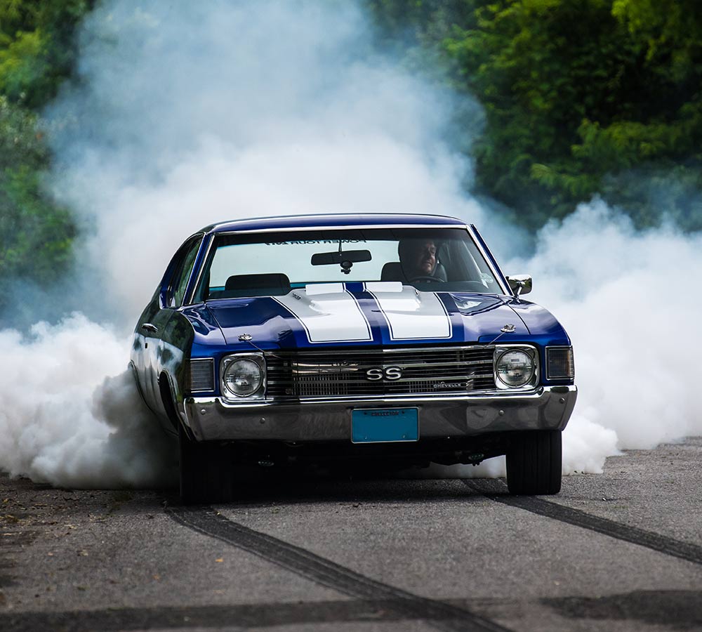 muscle-car-revving-on-road.jpg
